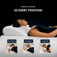 Pillow on a made bed